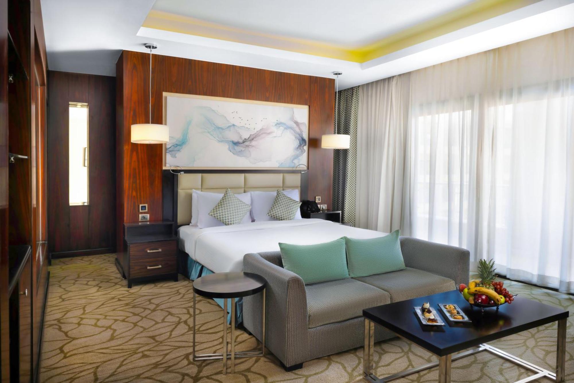 Chambre Lit King-Size Premium - Réservée aux Citoyens et Résidents Égyptiens - Vue sur Piscine